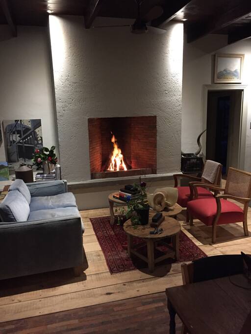 Lounge with lovely fireplace.