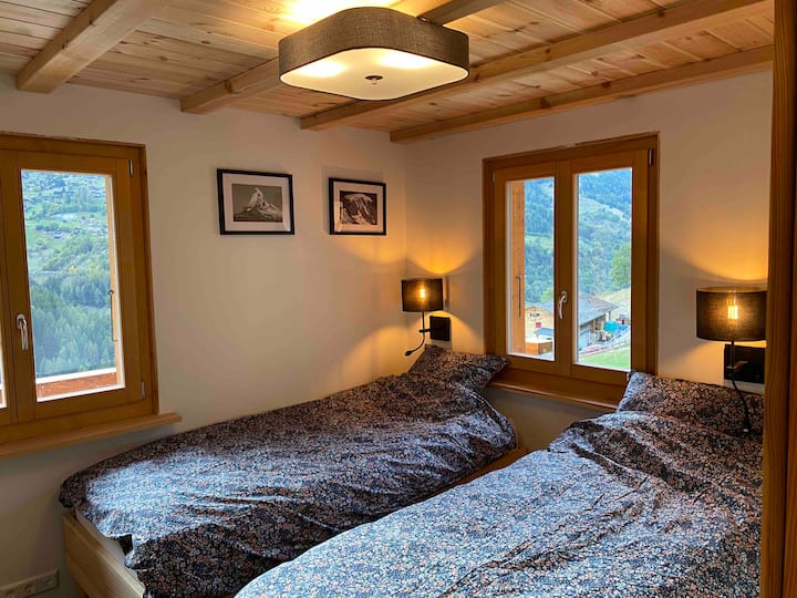 Bedroom 2, cozy bedroom with 2 comfortable  beds and spacious fitted wardrobe. 