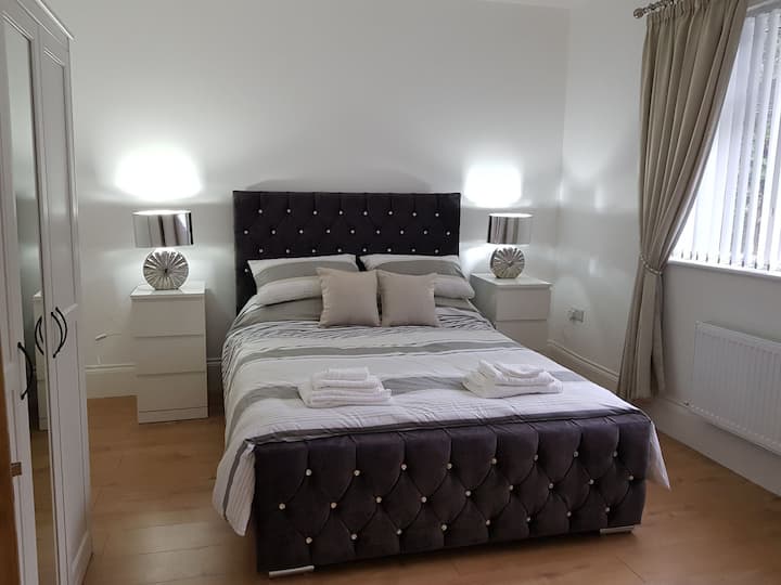 King size bedroom with smart TV 