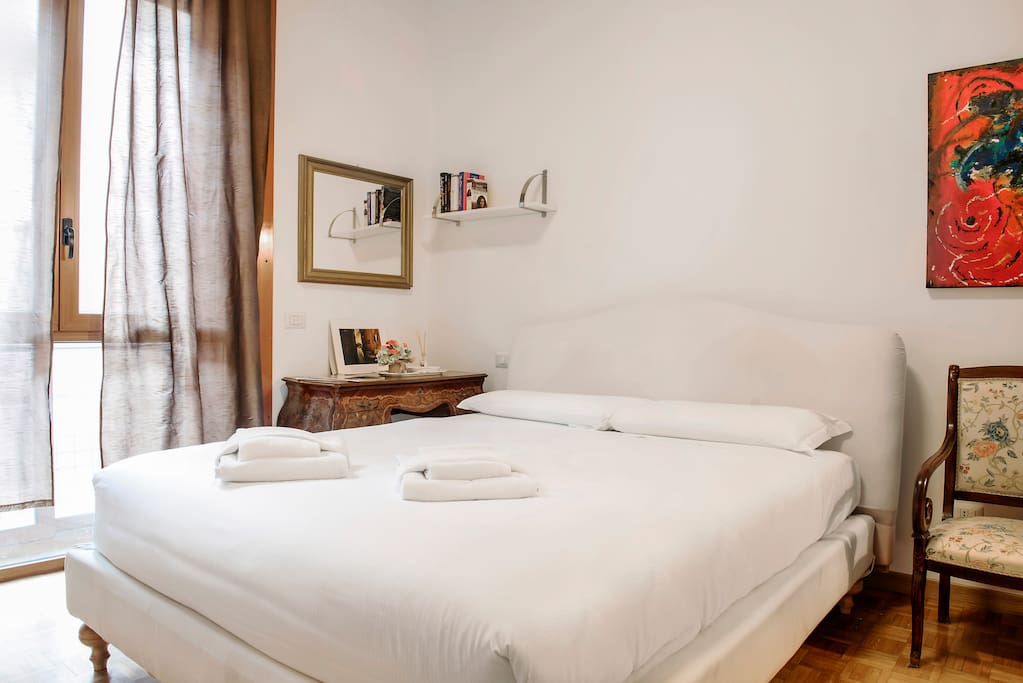 The Bedroom - The comfortable double bed with soft bed-linen and towels