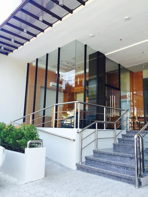 Main Entrance to establishment with a PWD ramp.