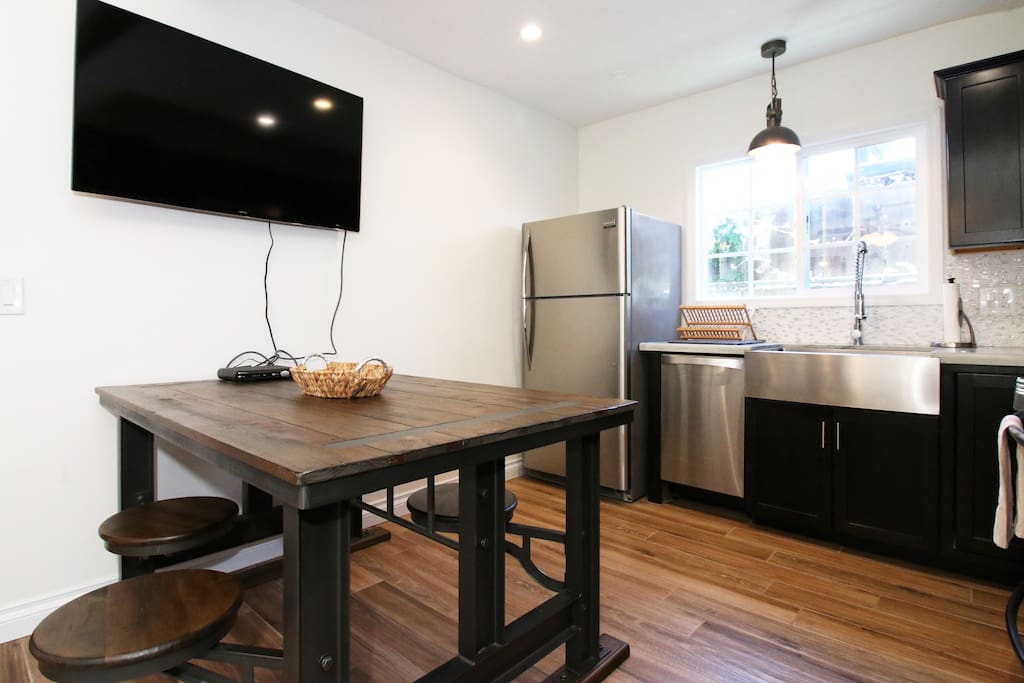 Multi-functional table that can also serve as an island or workspace