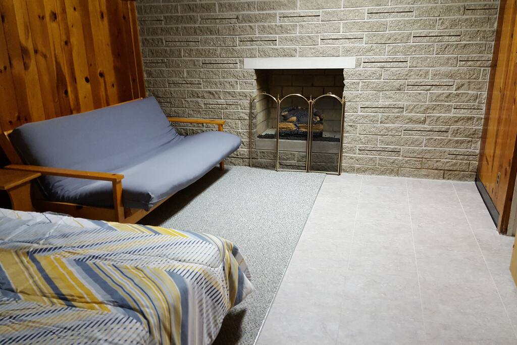 Bedroom with full size bed and full size futon bed.
