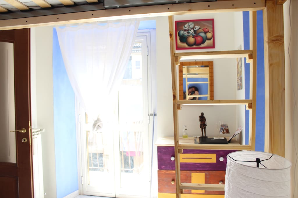 the private room with loft bed and balcony
