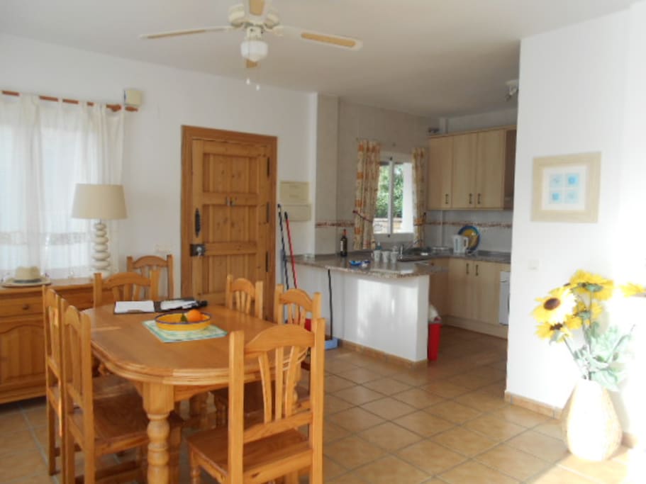 dining area into kitchen