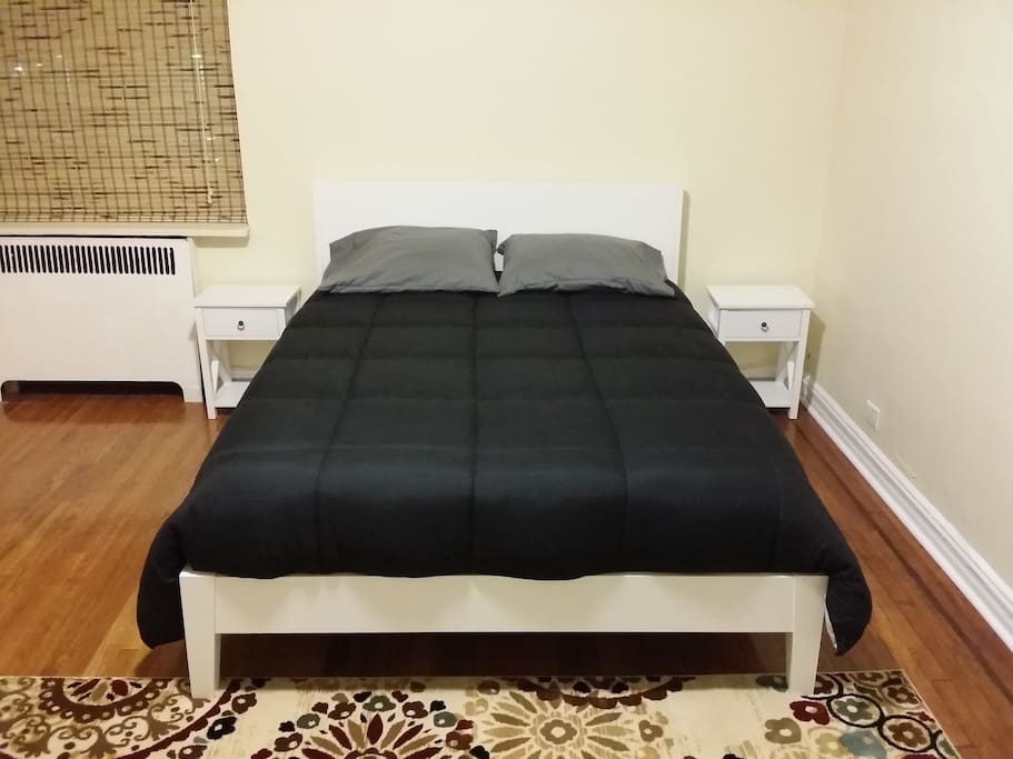 This enormous bedroom has huge windows with lots of natural light, a new queen size bedroom set, two sizable closets for your clothes and belongings, and free Wi-Fi with high speed internet throughout the entire apartment.