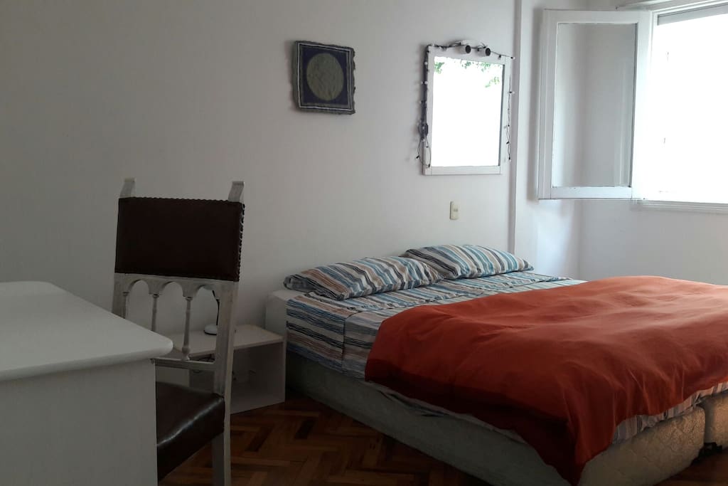 Matrimonial room. Queen size bed, a wordrobe , a bedside , a tv and a mirror. Size : 20 square meters aprox. It counts with a window facing to the Carlos Berg street. Comfortable and cozy room.