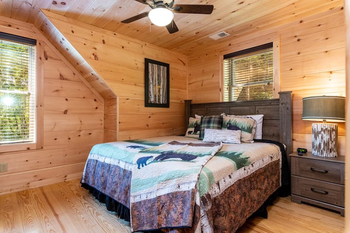 Bedroom 2: King bed, bright wooden accents and plush bedding create the perfect mountain escape!