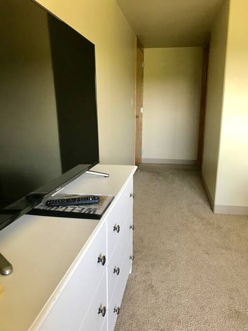 Hallway that shows the way to your own private bathroom with shower