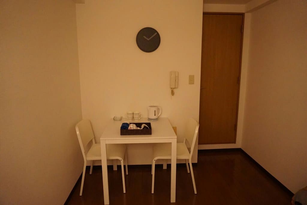 small tea table. you can sit down and have a tea with hot pot.