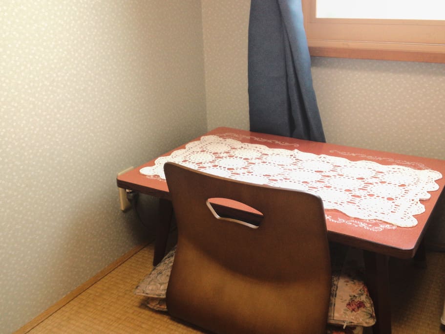 The rooms feature tatami (woven-straw) floors and Japanese futon bedding. Each comes with a seating area with a low table. Bathrooms and toilets are shared.