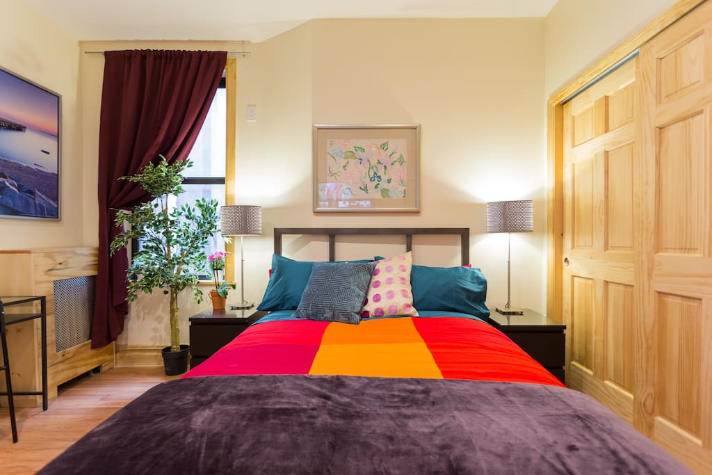 *large closet with sliding doors; mini refrigerator and microwave are in closet