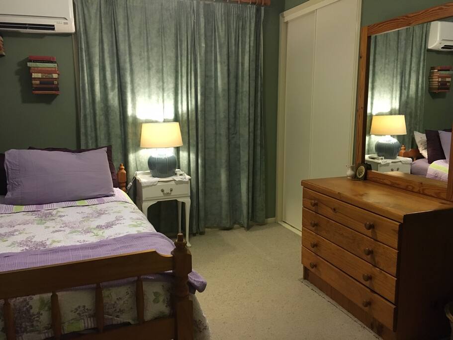 TV and DVDs in room. Single bed (extra foam layer) with pull-out mattress underneath. Extra linens in the closet if needed for additional mattress. This room is quite small but cozy.