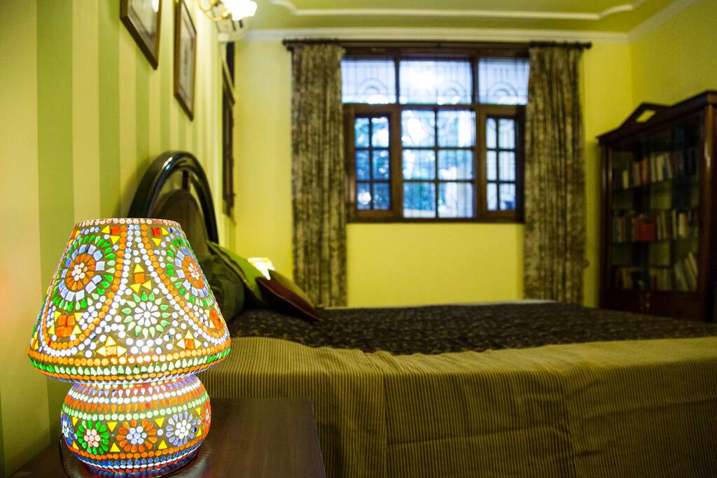 Side table with an indie lamp.