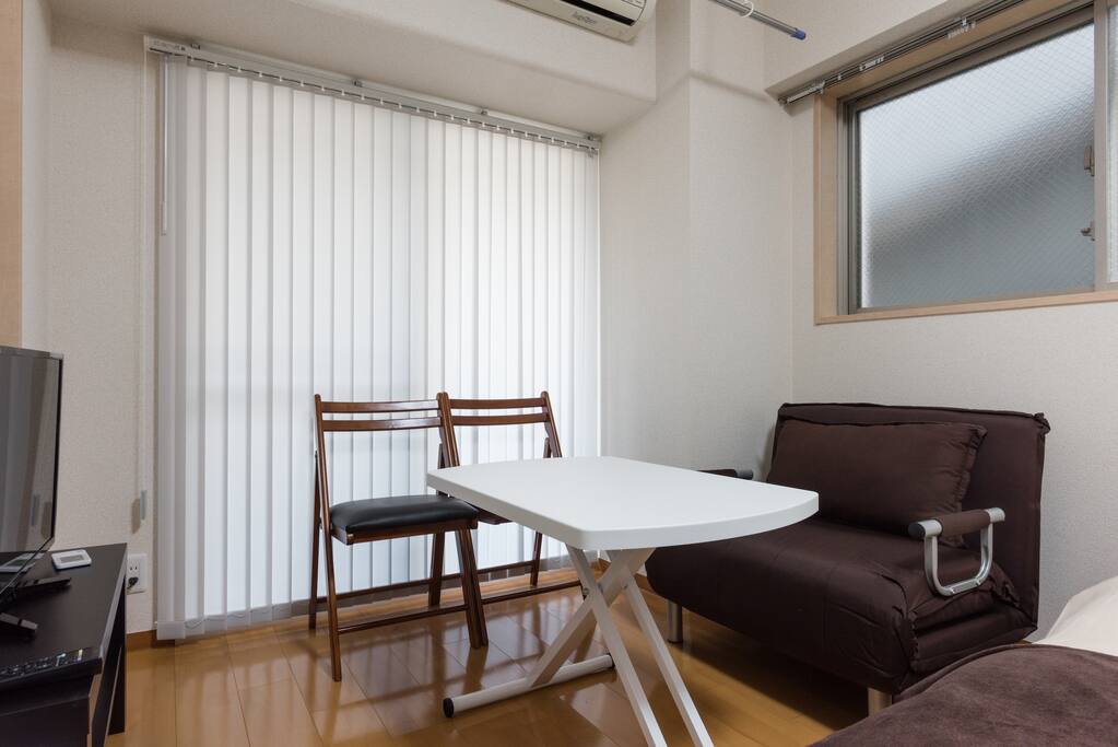 Table, sofa, and chairs