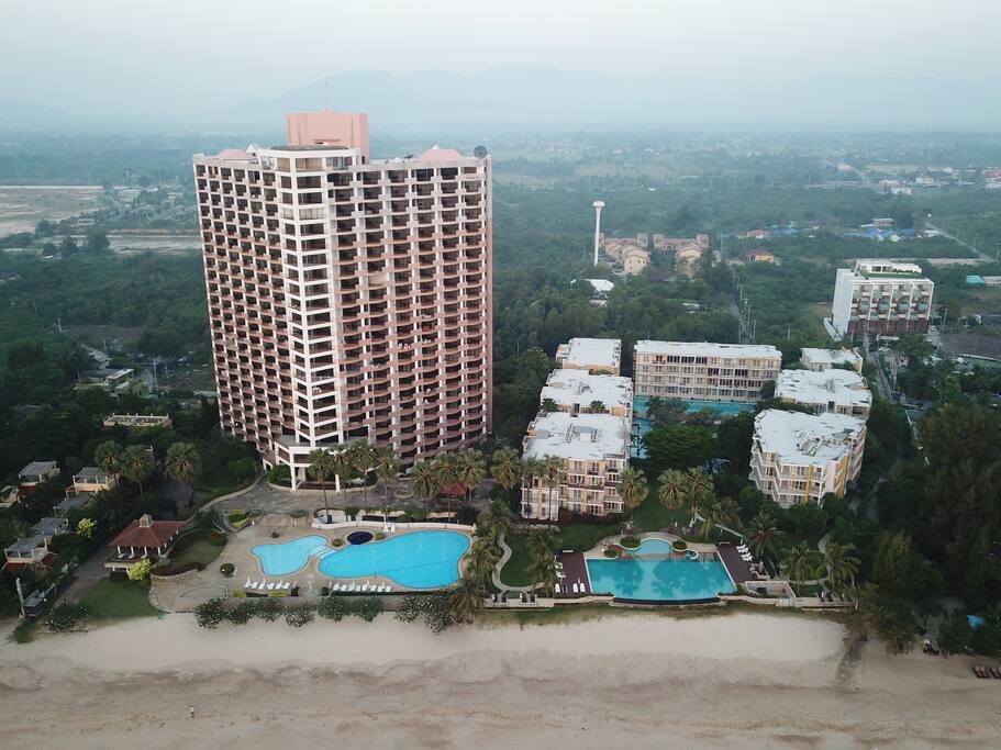 Cha-am Beach Club (Left tall bldg.)