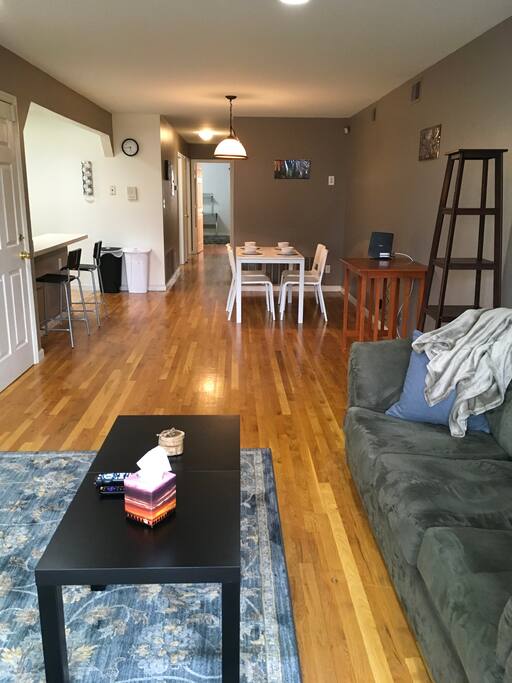 View from the living room, including the kitchen, dining and the bedroom hallway beyond. The apartment includes Verizon Fios fiberoptic 100mbps internet service and super fast Wi-fi. You can stream, check on your broadway show tickets or Skype your family back home.