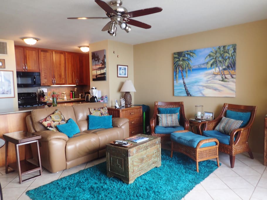 living room, kitchen, dining table and chairs for eating ndoors or working next to large screen TV,