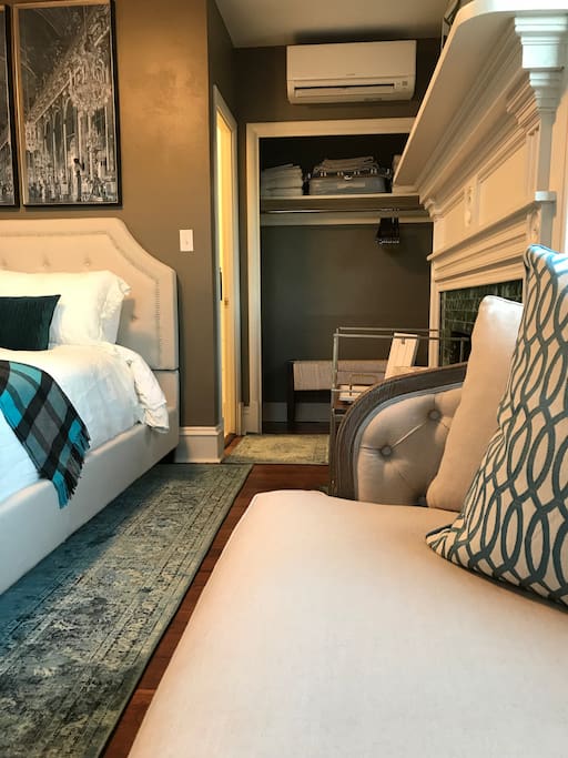 Large closet for your suitcase and hanging items.