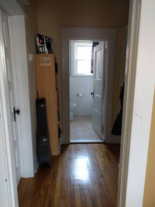 Bathroom - larger bedroom on left, smaller bedroom on right.