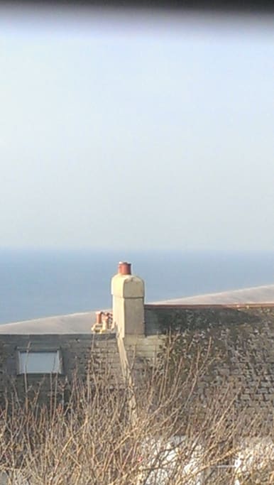 View to the left from the top floor overlooking Chesil Beach out towards Devon.