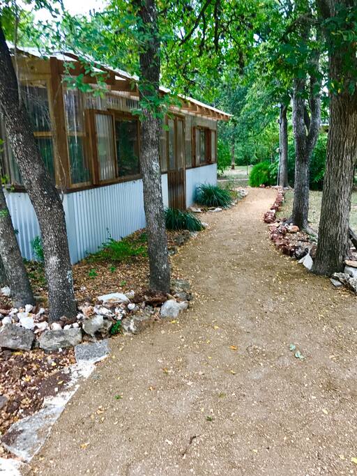 Take a walk around the studio! Ferns, oak trees, and succulents abound.