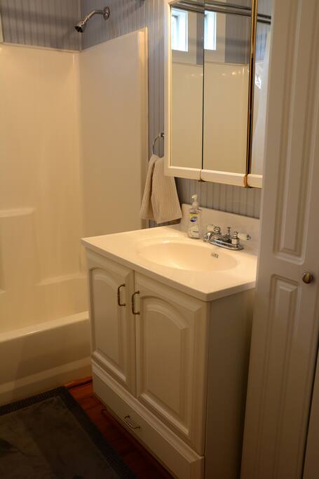 Bathroom with tub/shower.