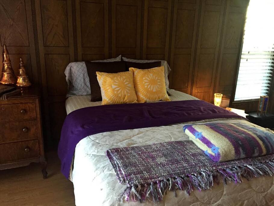 another view of queen sized bed with serta pedic mattress with memory foam