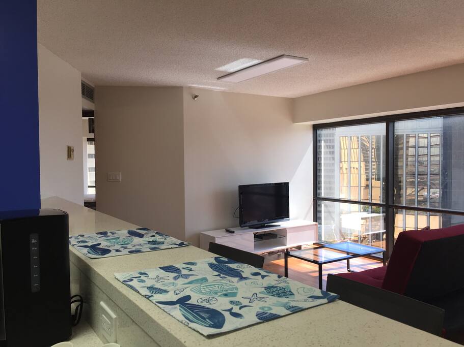 Spacious living room with open kitchen