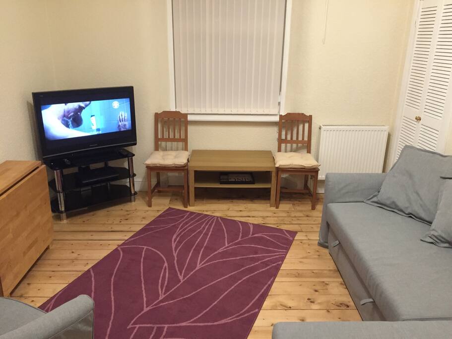The TV in the living room has cable available