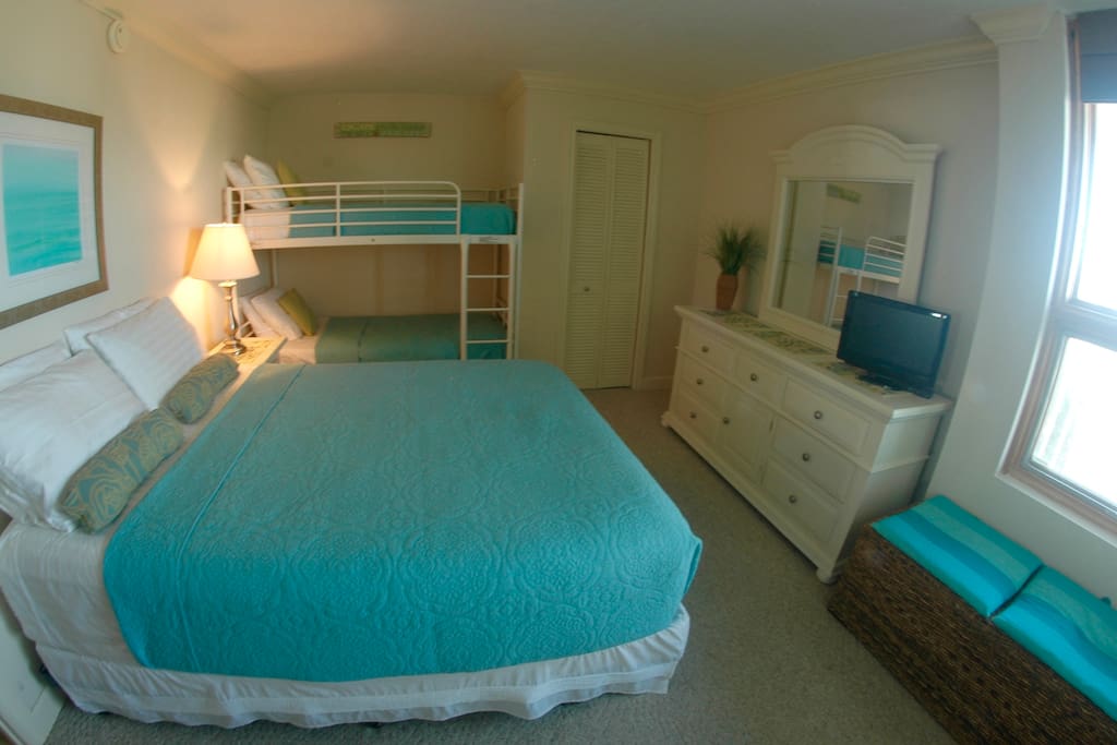 Bedroom with Queen bed and twin bunk beds