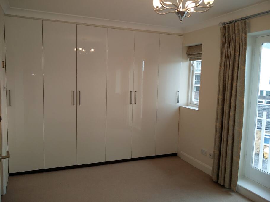 En-suite master bedroom with enormous fitted wadrobe