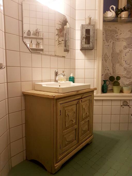The bathroom also have a shower.