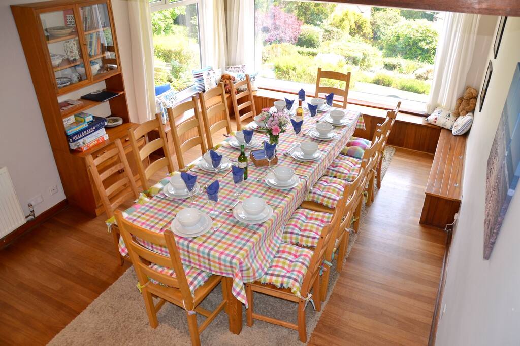 Lovely dining room seats 12. High chair available