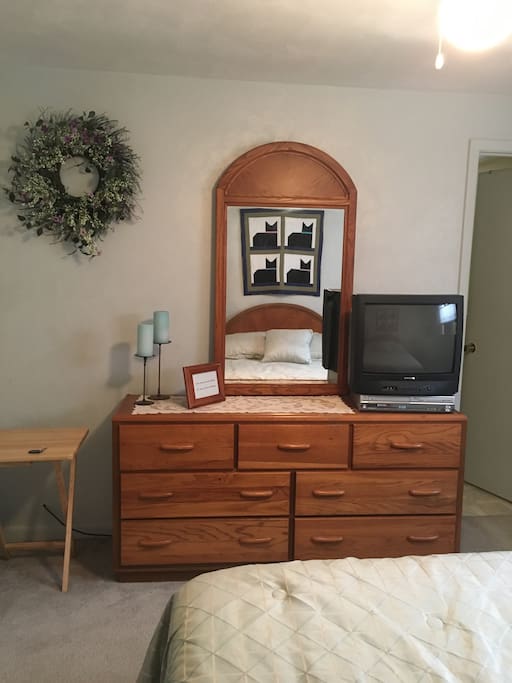 Bureau in queen bedroom with TV