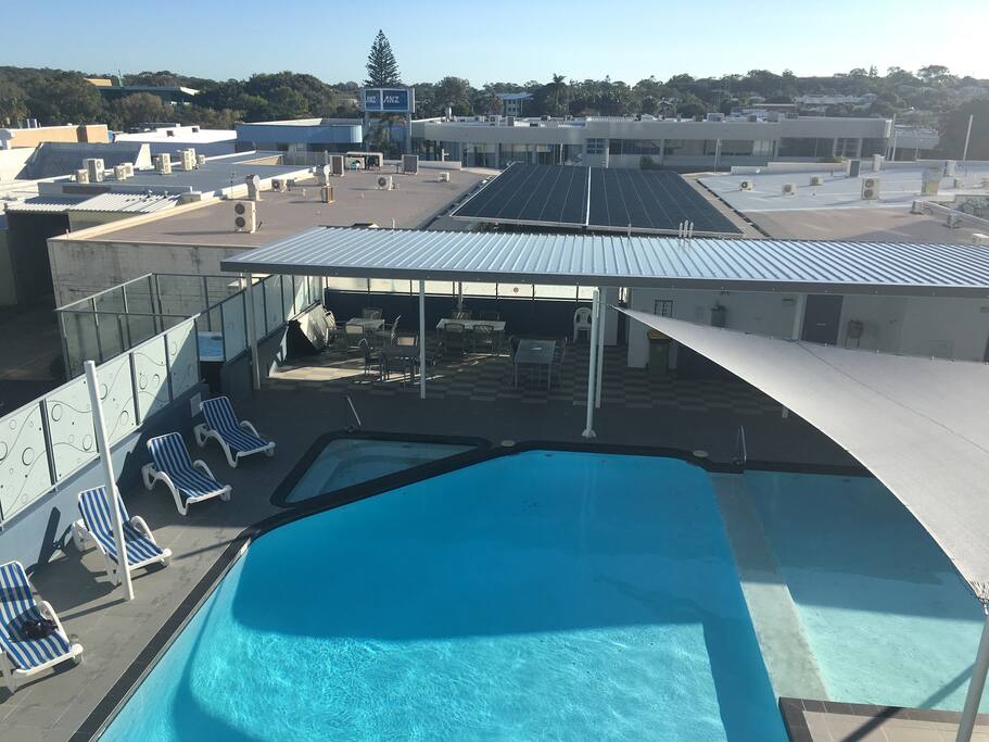 View from your room. Heated pool. BBQ area. 2 spas - 1 attached to pool and hot tub (left corner). 2 saunas on right. Swedish style hot air sauna and the infrared sauna.