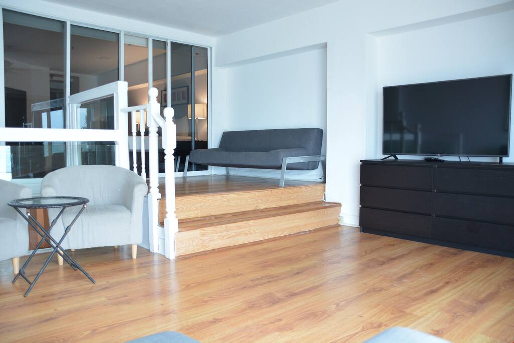 This duplex apartment features lovely decor and minimalist touches.