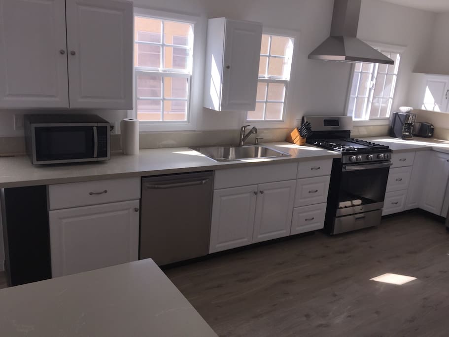 All remodeled kitchen equipped with appliances.