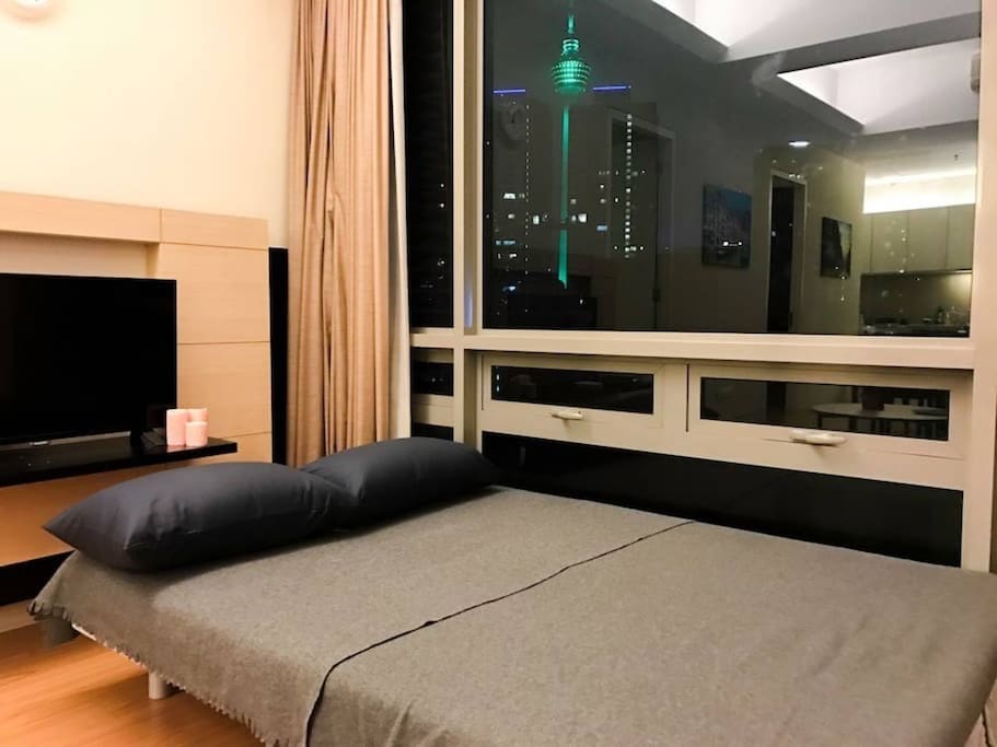 Sofa bed and the KL night view