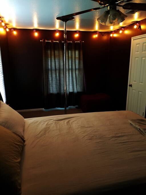 Subtle lighting, door to private bathroom