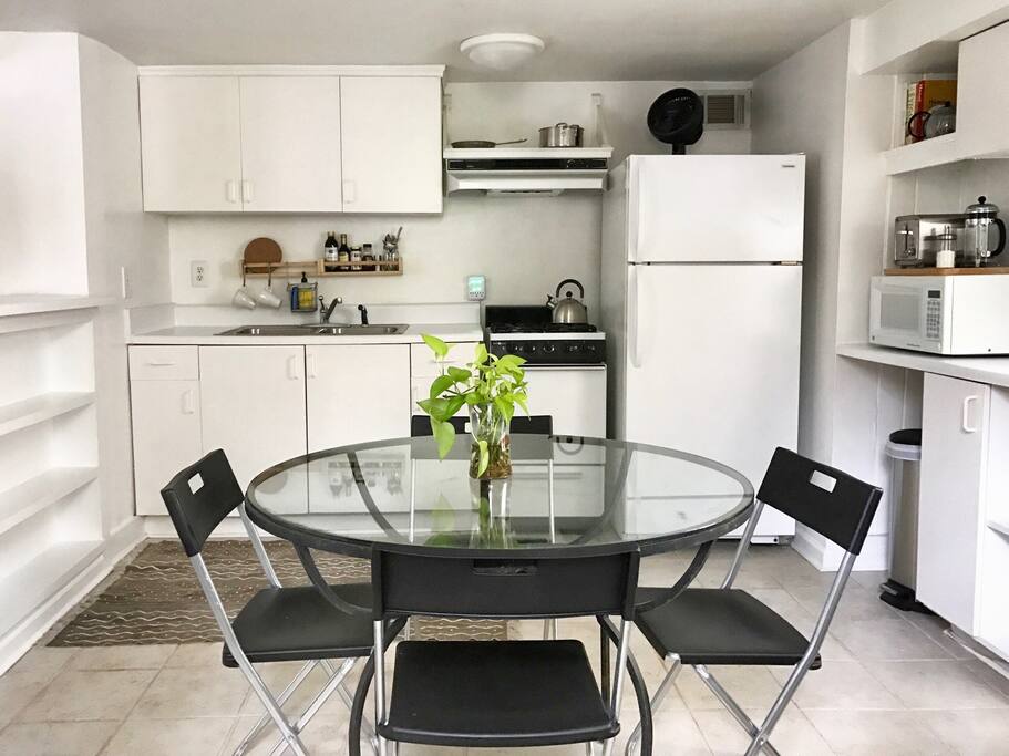 Eat in kitchen, gas range, full size refrigerator, microwave, French Press, utensils & cookware.