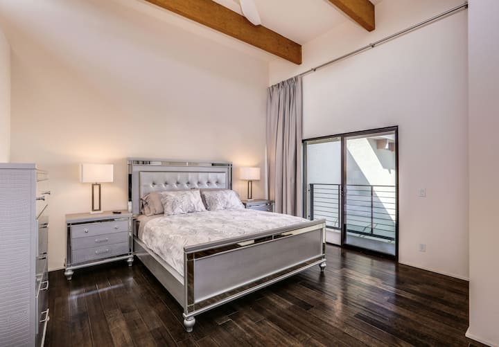 Bedroom 1 - king size bed, walk in closet, ensuite bathroom, 60" smart TV and private balcony