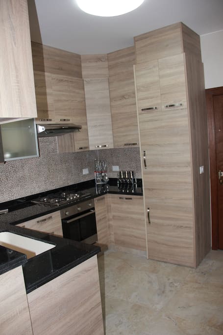 Fully equipped open-american kitchen