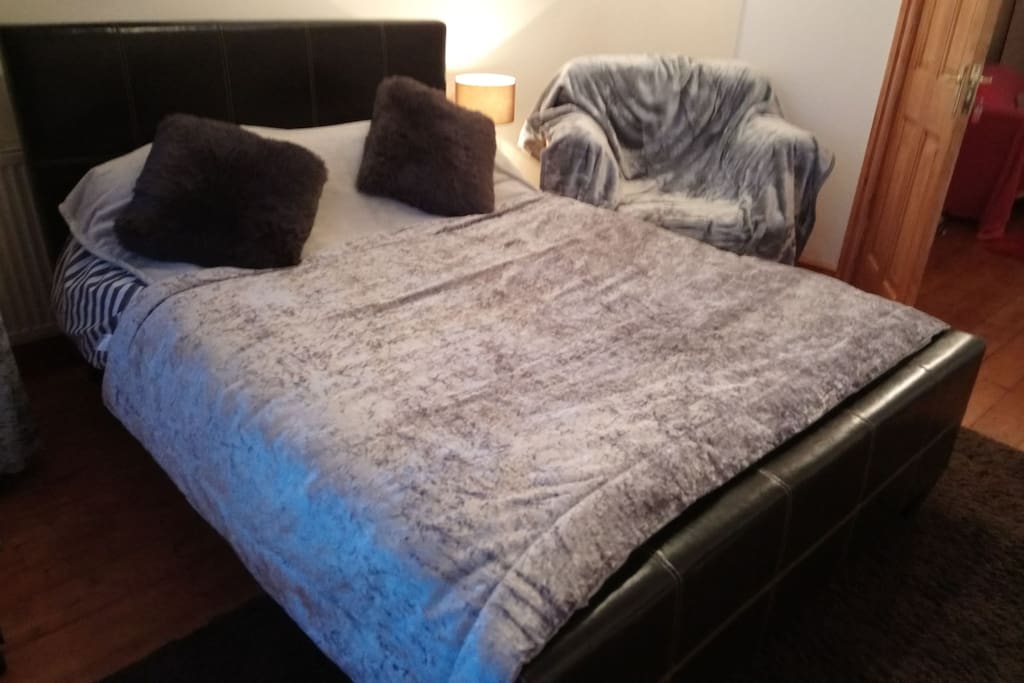 Spacious downstairs bedroom in a shared house.