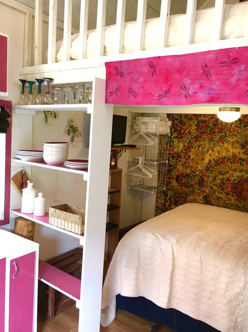 Kitchen shelving, lower Queen Bed, upper loft King Bed.
