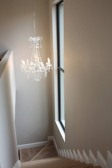 Stairway with elegant chandelier