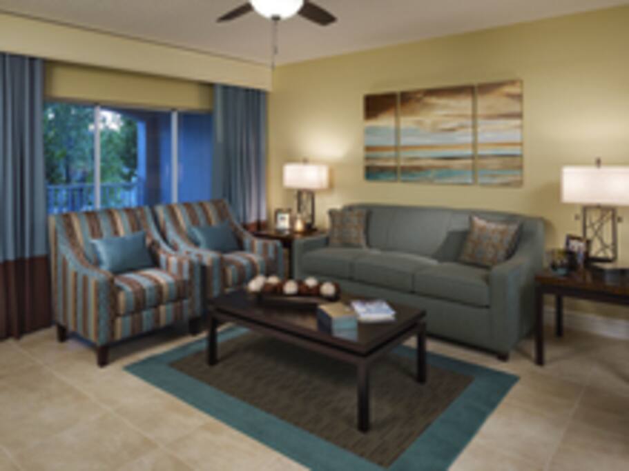 Shared Living Room, TV, Door to Furnished Patio