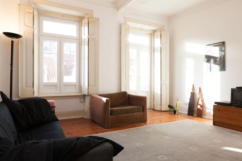 The living room with great view over Lisbom and the river.