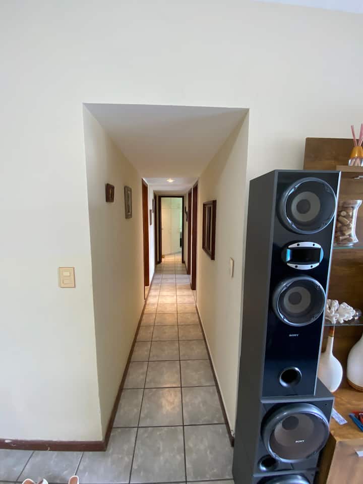 Hallway that gives access to the bedrooms, bathrooms and suite.