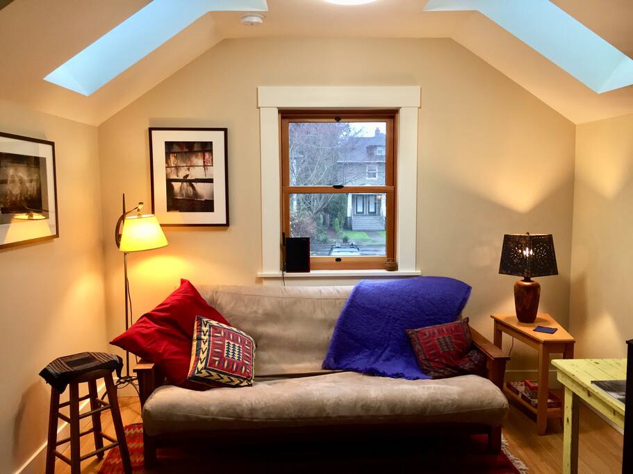Futon couch in living room upstairs.